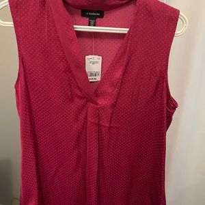 Pink sleeveless blouse